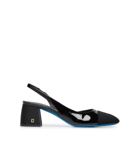 Black fabric and patent leather slingback pumps with logo plaque.