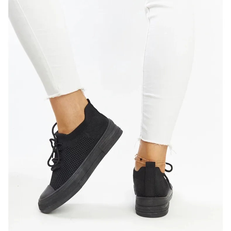 Black lightweight sports sneakers by Senaida