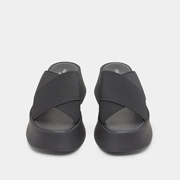 Cross-strap wedge mules in black elastic