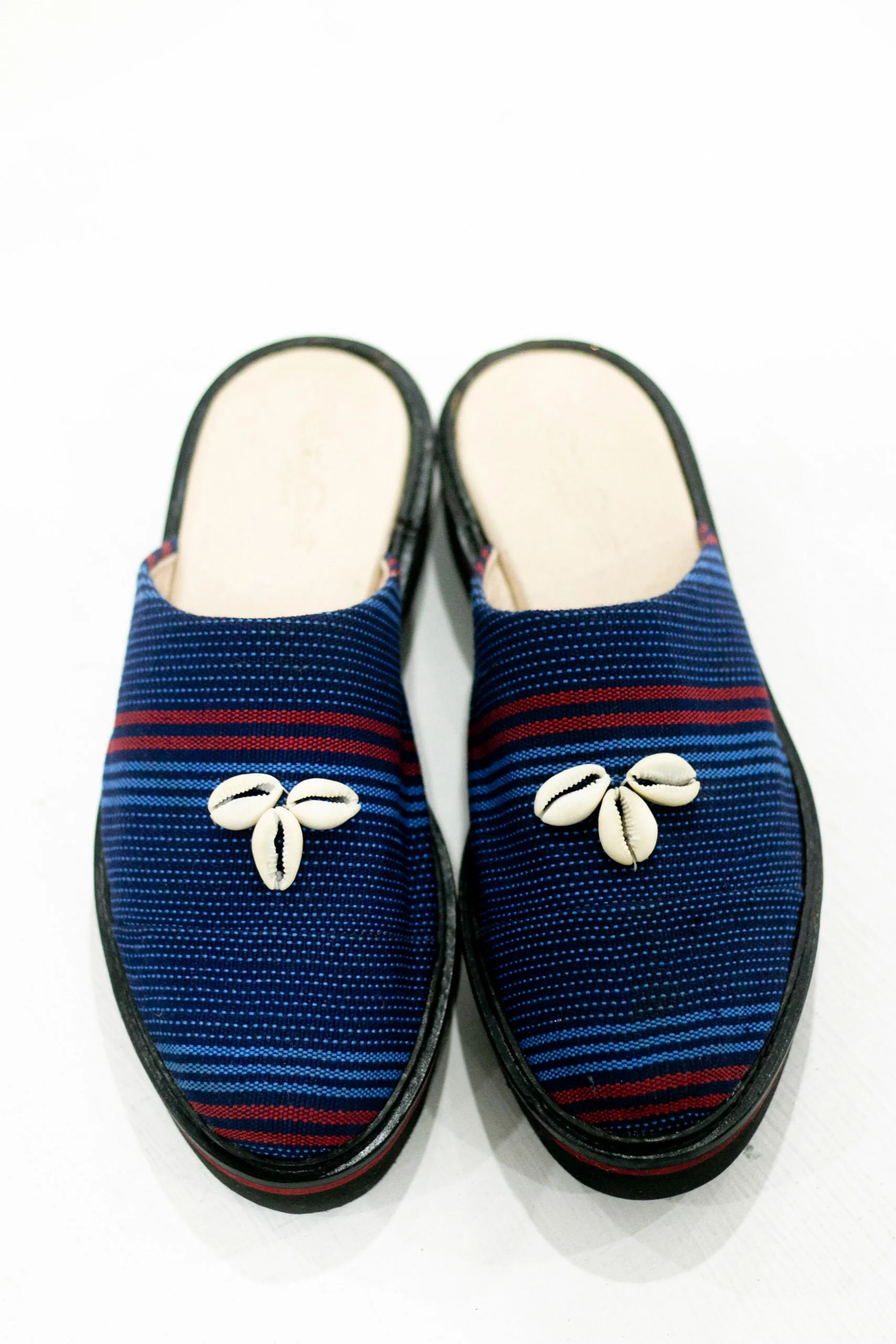 Cute-Saint Oke Lightweight Mules with deadstock leather and cowrie detailing