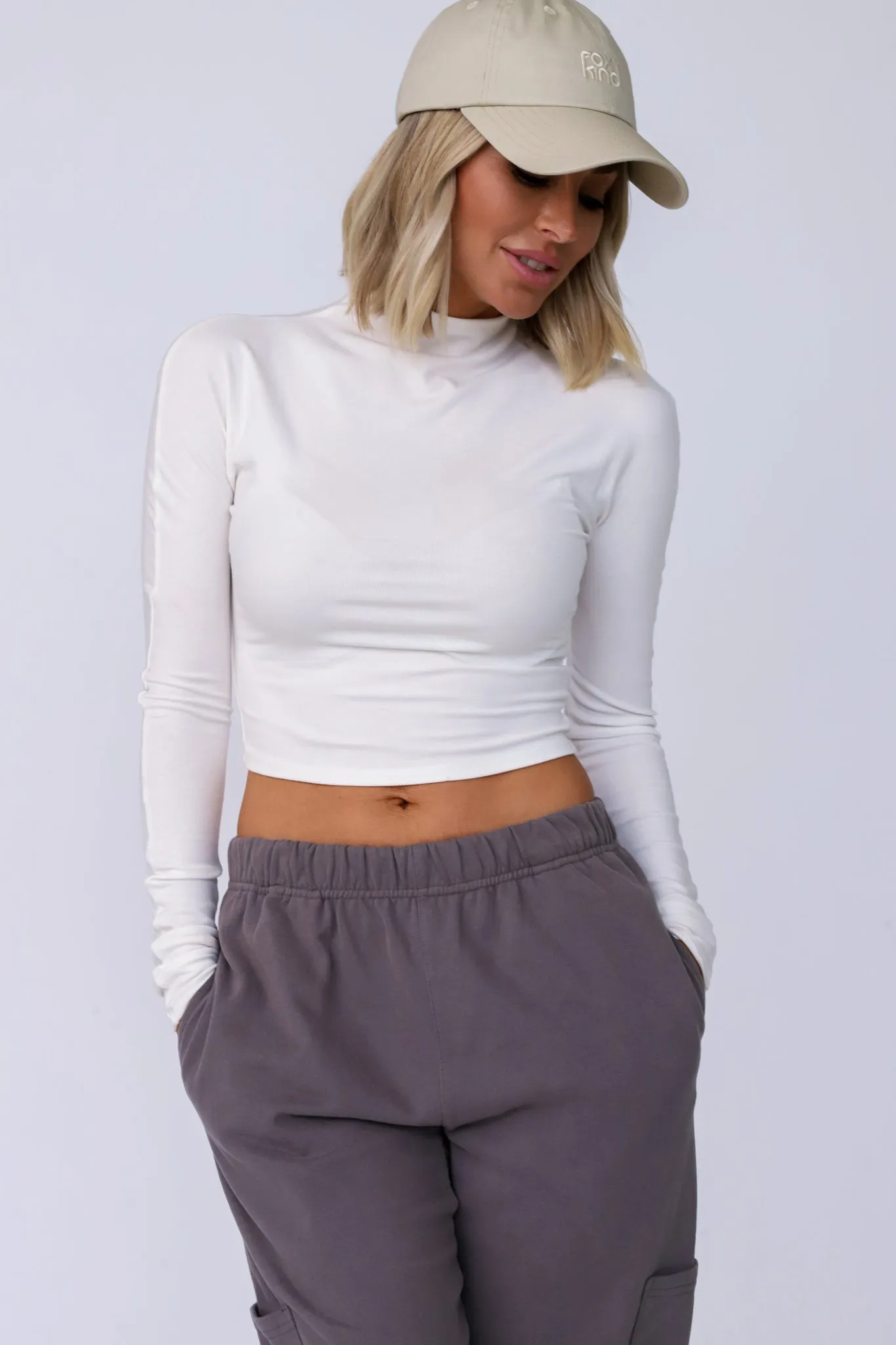 White Sleeveless Crop Top - Shop Now.