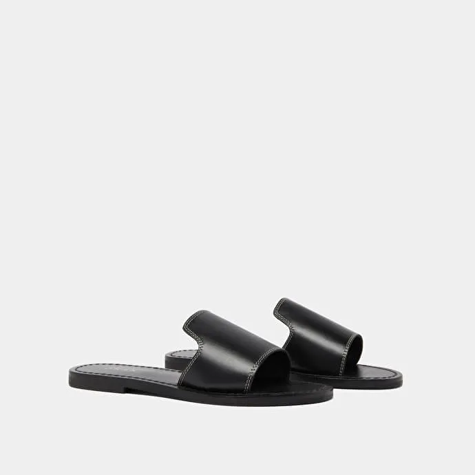 Open-toe mules in black leather