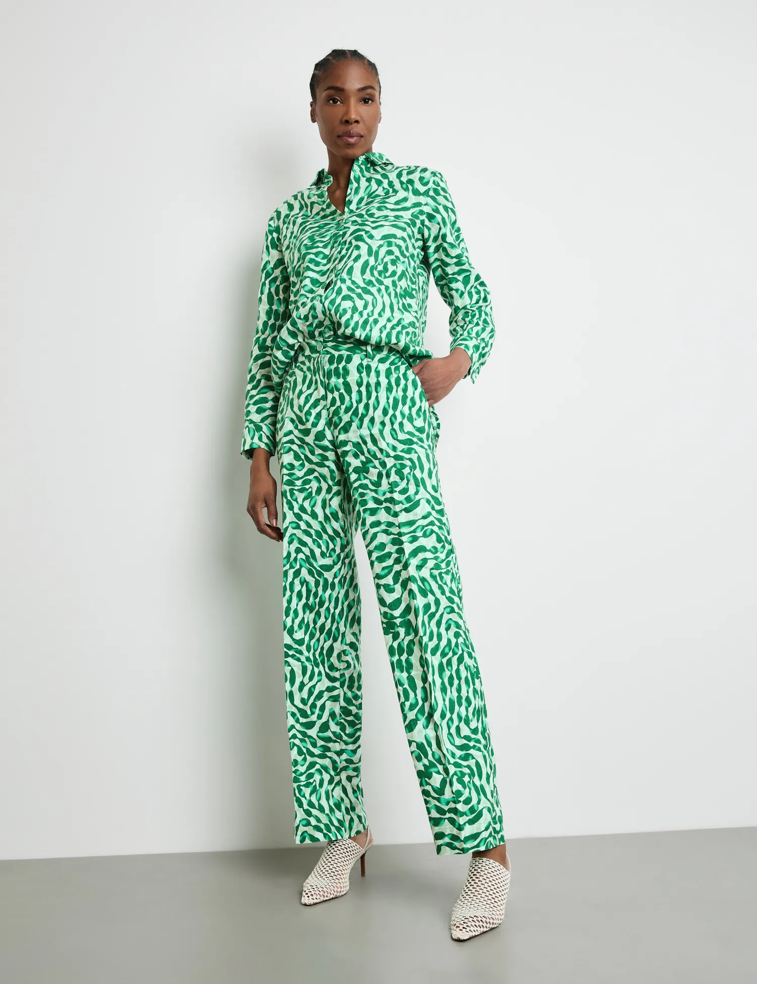 Patterned linen trousers with pressed pleats