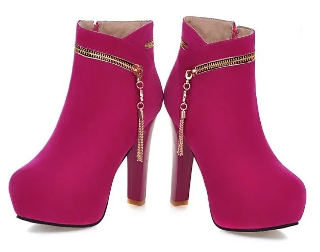 High heels boots in pink fuchsia suede with gold zipper