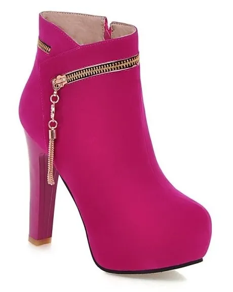 High heels boots in pink fuchsia suede with gold zipper