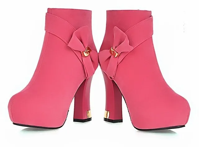 Pink suede high heels boots with gold metal bow