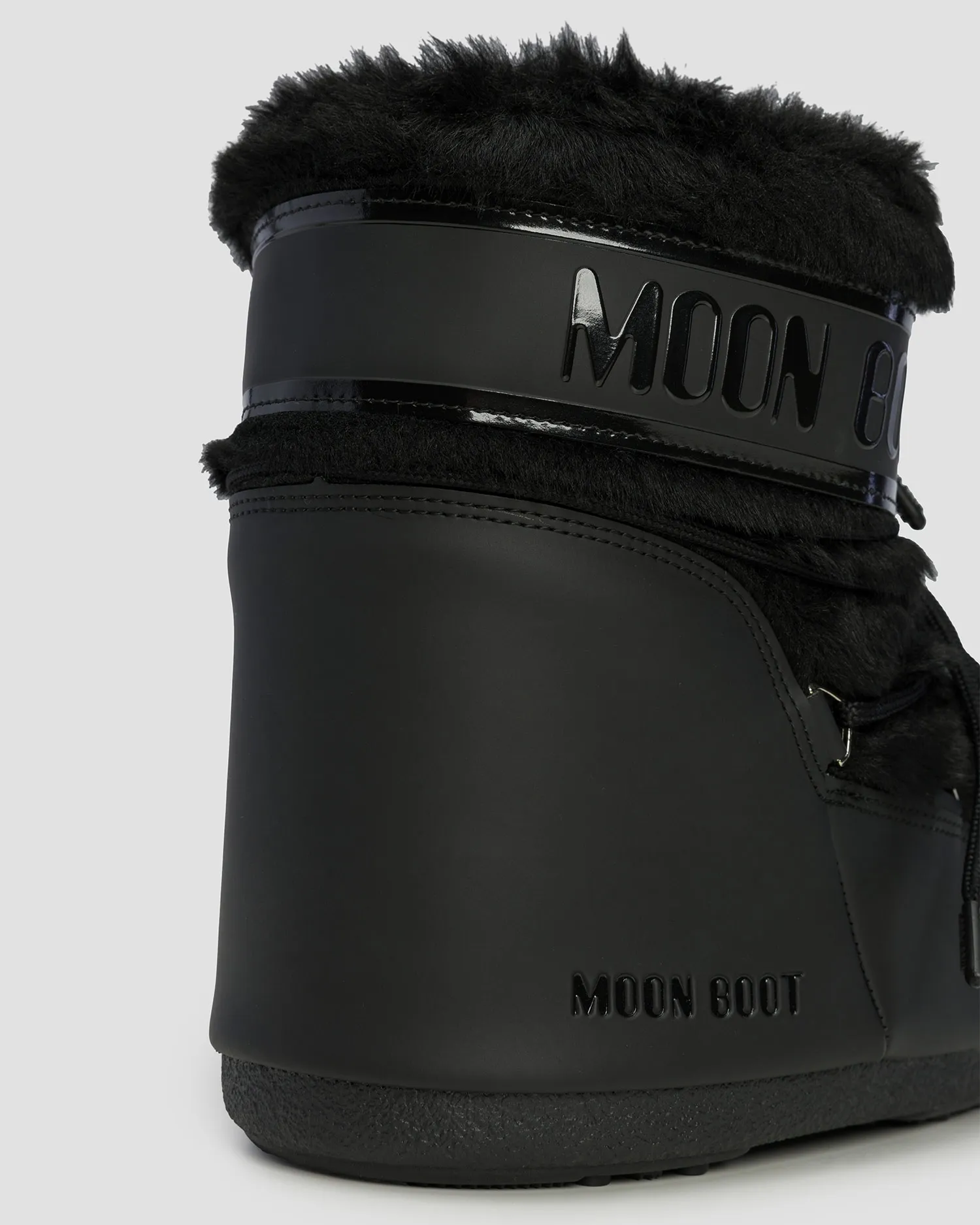 Women's black snow boots Moon Boot Icon Low Faux Fur 80D1409390-n001